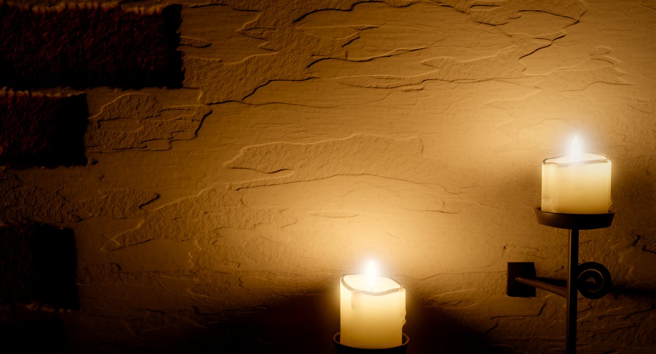Candles against a stucco wall